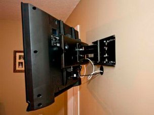 Установка телевизора на стену, подключение и настройка